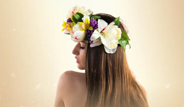 Model woman with crown of flowers