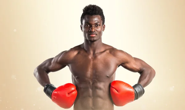 Handsome black man with boxing gloves