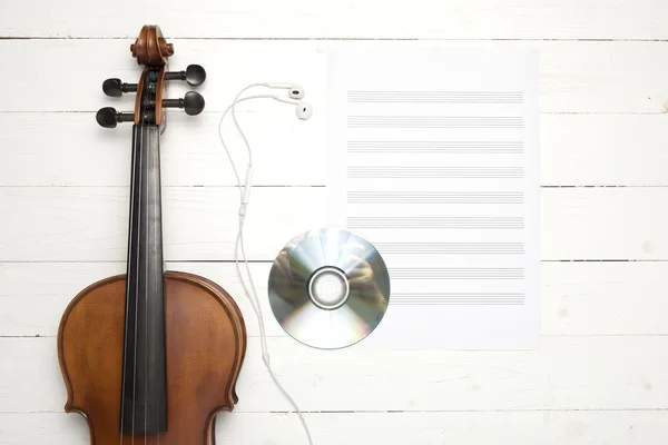 Violin with music paper note and dvd disc