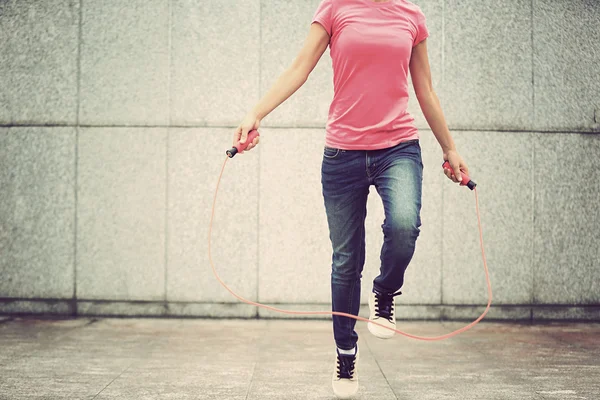 fitness woman jumping rope