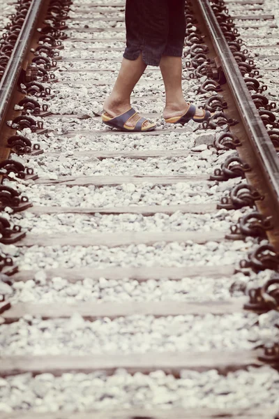 Vintage color of picture in People were crossing old Railroad.