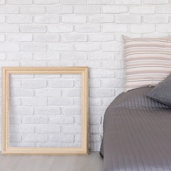 Bedroom with decorative brick wall