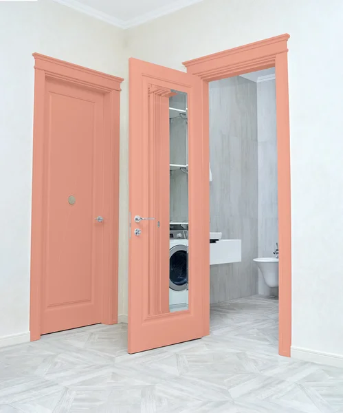 Close up of closed wooden door in the empty room