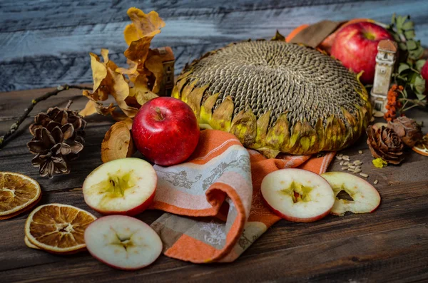 Vintage autumn red apples on wooden background