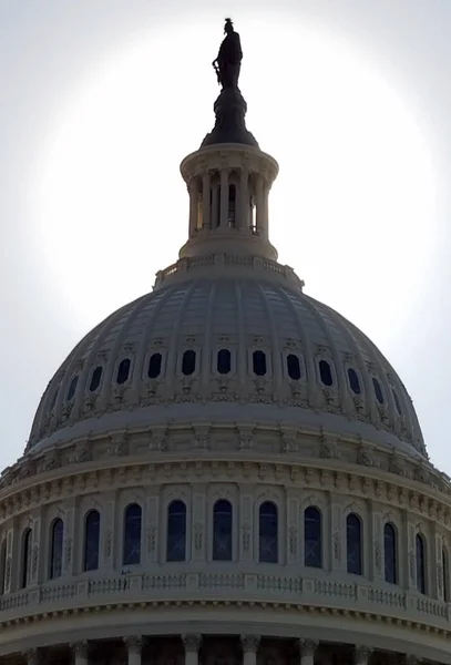 Backlit view of the United States Capitol Building