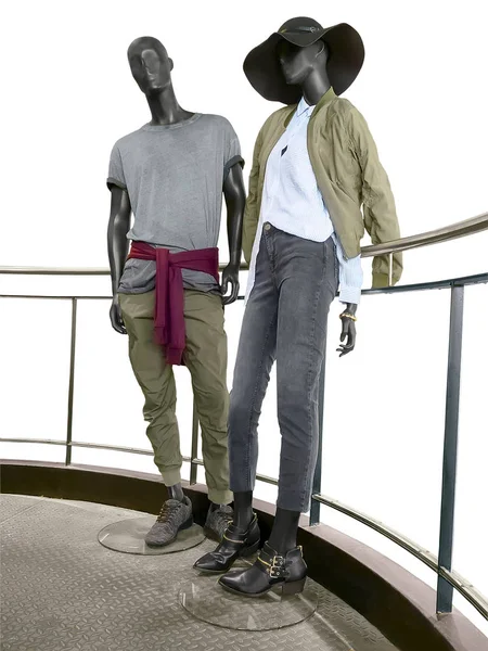 Two mannequins, male and female.