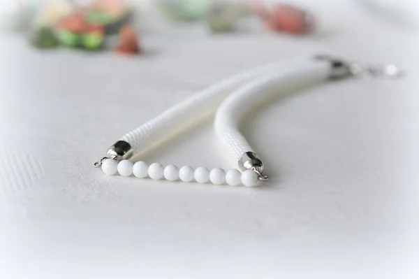 White necklace made of seed beads