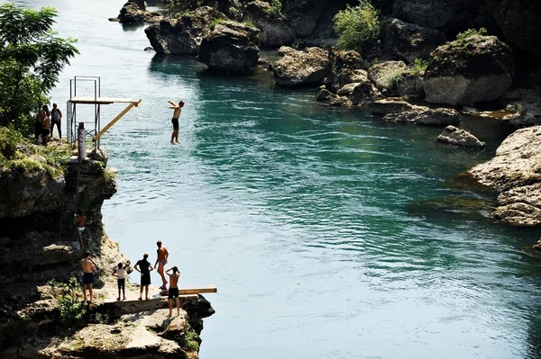 High diving into Neretva river in Mostar