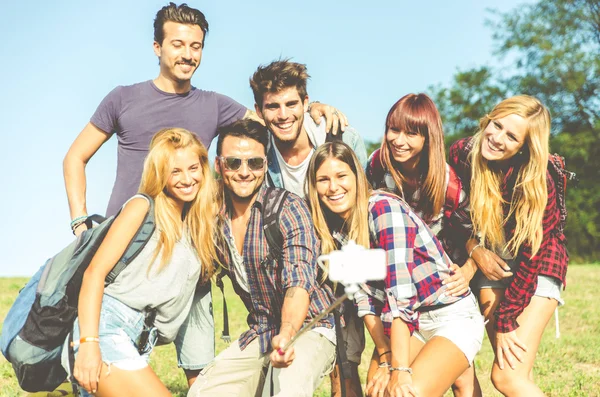 Friends trekking and taking selfie