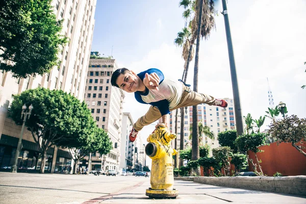 Man doing parkour on street