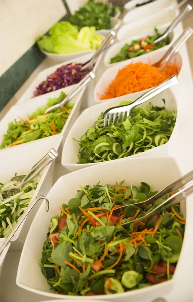 Salad bar with a variety of fresh vegetables