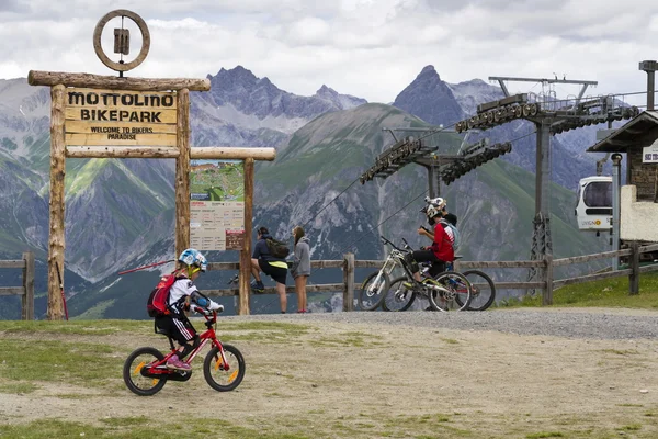Mountain bike riders getting ready in Mottolino bikepark on 3 August 2016 in Livigno, Italy.