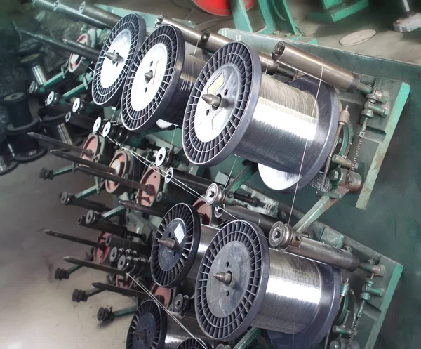 Steel wire spool making machine.