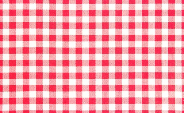 Red picnic cloth background.