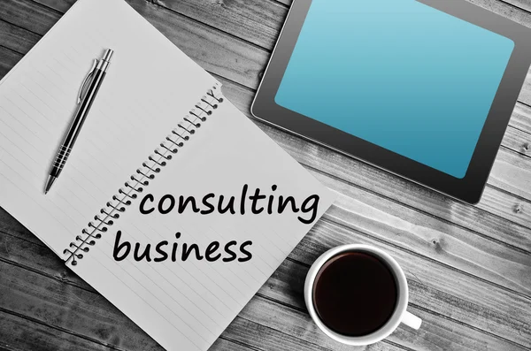 Consulting business words on notebook