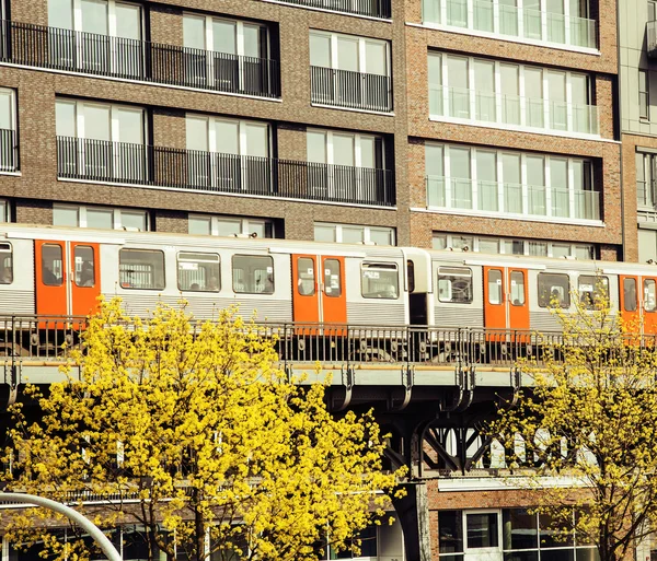 Railway train going throw city. citylife view vintage post card.