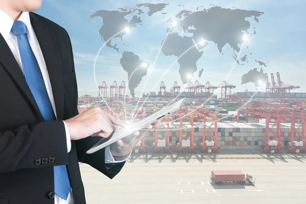 Import, Export, Logistics concept - Businessman press digital ta
