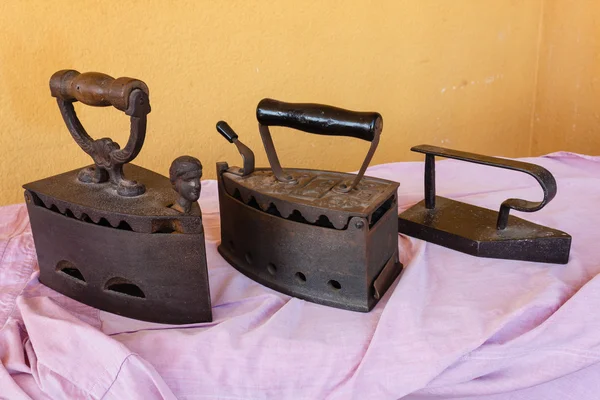 Three vintage irons