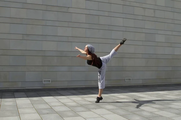 Sport, dancing and urban culture concept - beautiful street dancer