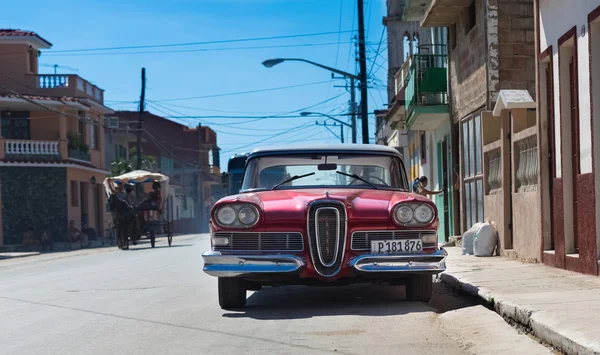 Havana, Cuba - September 11, 2016: Red american Ford Edsel classic car with white roof parked on the street in Havana Cuba - Serie Cuba 2016 Reportage