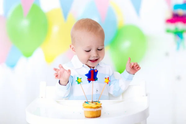 Little baby boy celebrating first birthday