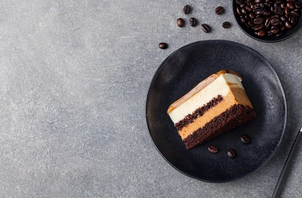 Coffee and caramel cake, mousse dessert on a plate