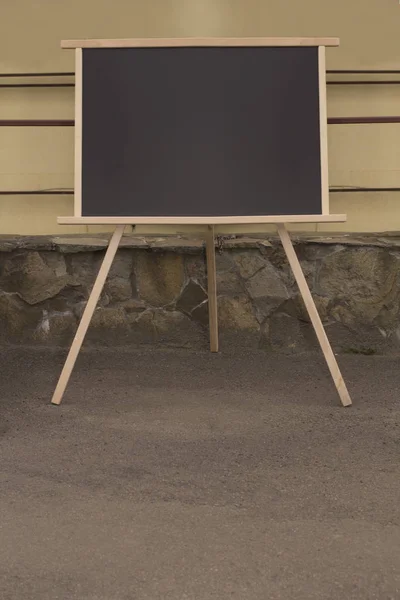 Empty restaurant blackboard at the street