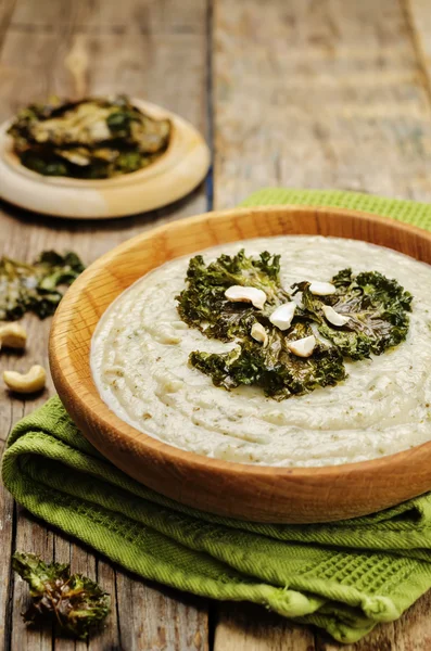 Cauliflower kale soup with kale chips and cashews