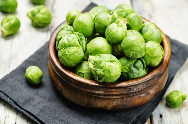 Brussels sprouts in a wooden bowl