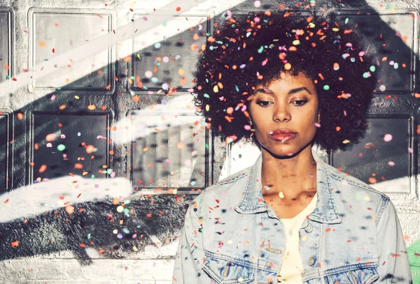 Sad and serious black woman during a celebration