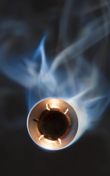 Bullet with smoke behind