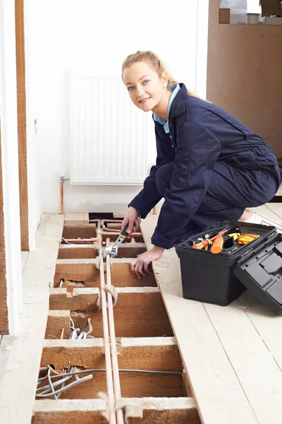 Female Plumber Fitting Central Heating System