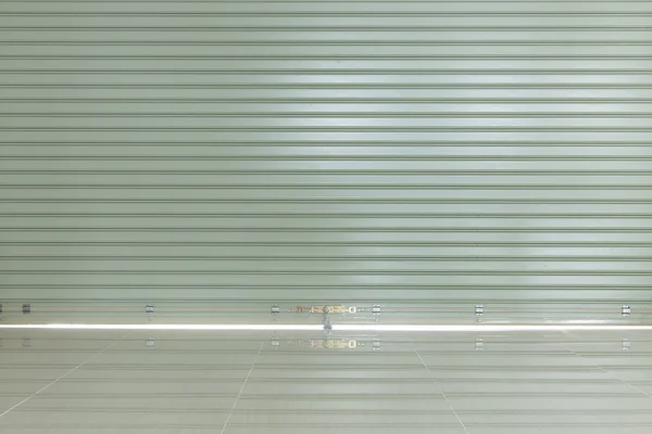 Aluminium steel roller shutter door and tile floor
