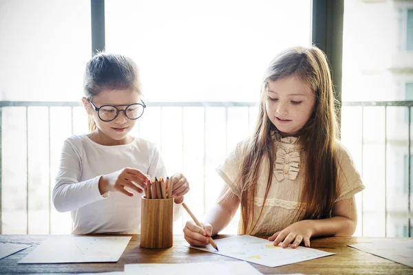 Girls Drawing in coloring-book