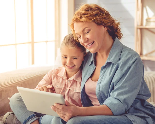 Grandma and little girl at home