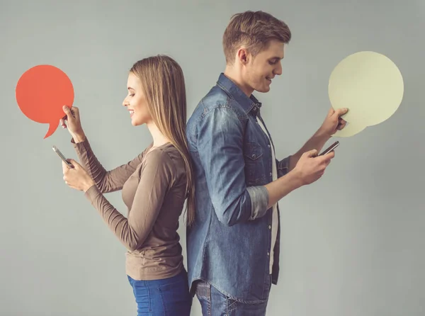 Young couple with speech bubble