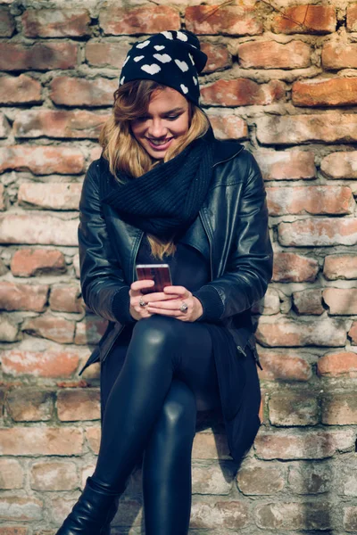 Woman using smart phone