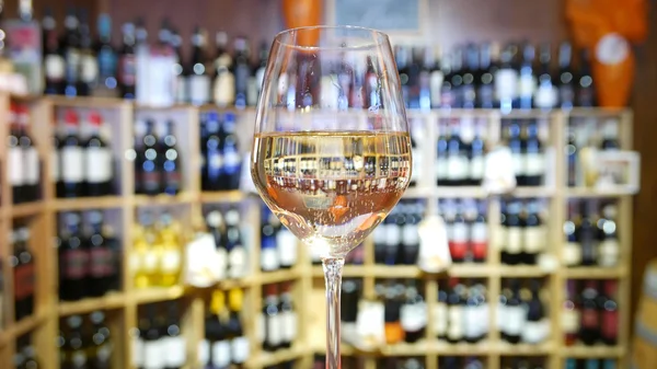 White wine glass in an Italian wine bar.