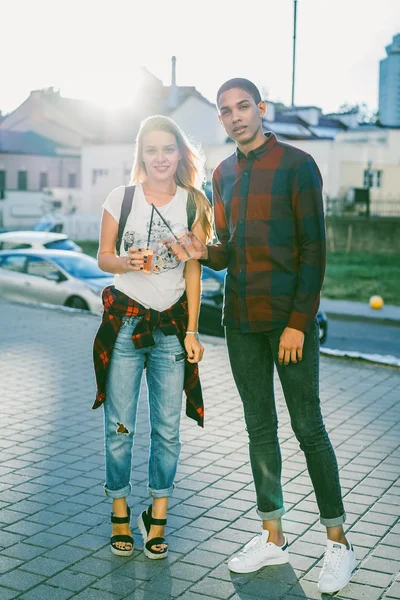 Young mixed Couple In city