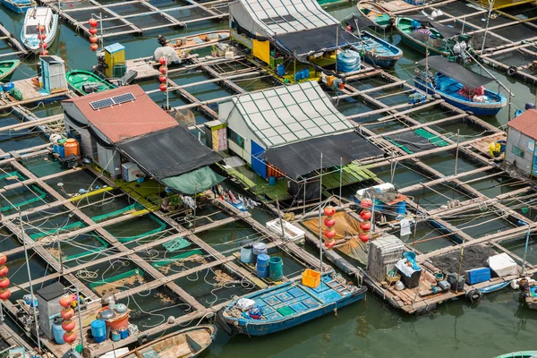 HAINAN, CHINA - 12.09.2016: fishing village of poor people on the sea water in island Hainan in China