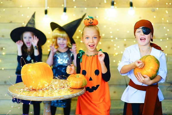 Happy group witch children during Halloween party