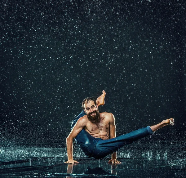 The male break dancer in water.