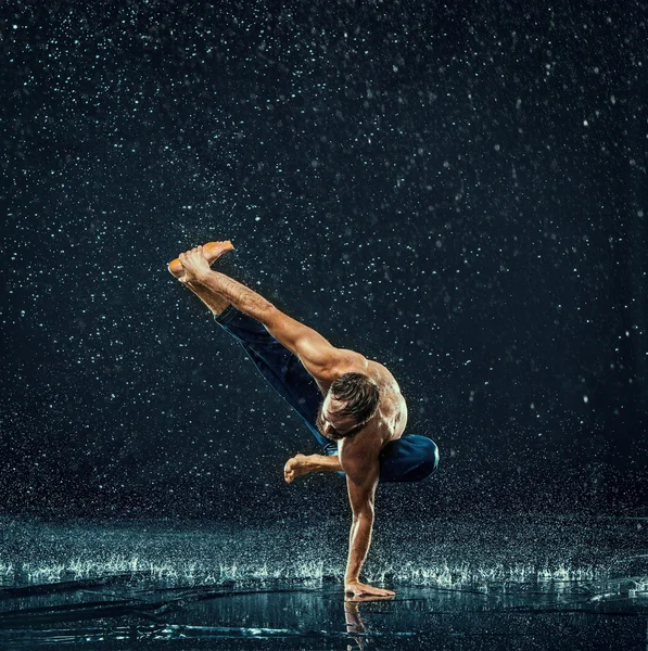The male break dancer in water.