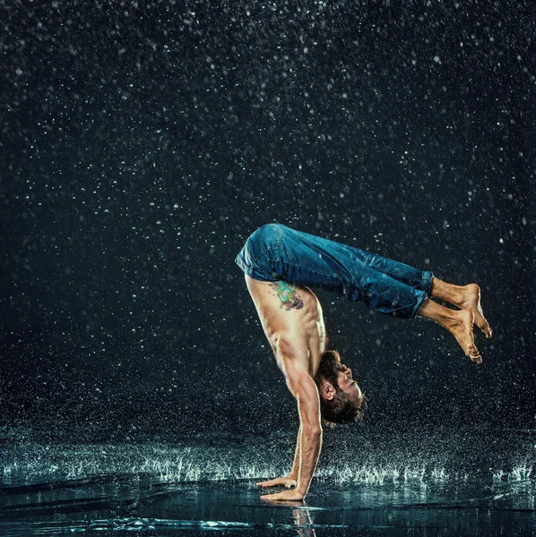 The male break dancer in water.