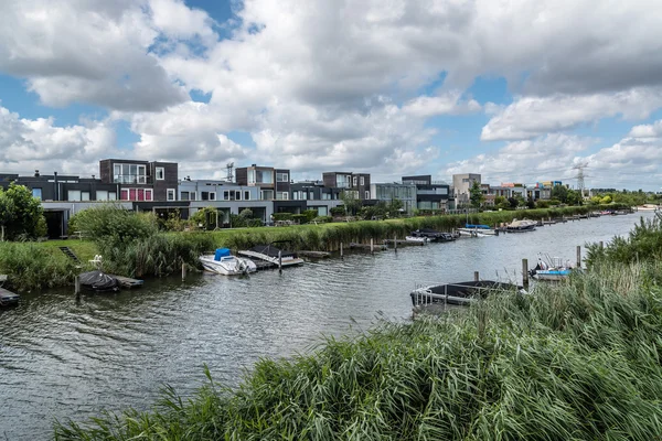 Modern architecture houses in a canal in Amsterdam