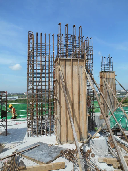 Column timber form work and reinforcement bar at the construction site