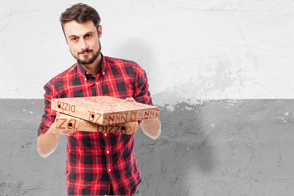 Happy young man with pizza box