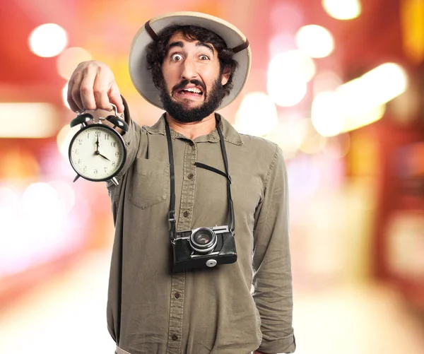 Crazy explorer man with clock