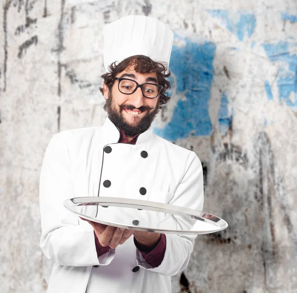 Happy cook man with silver tray