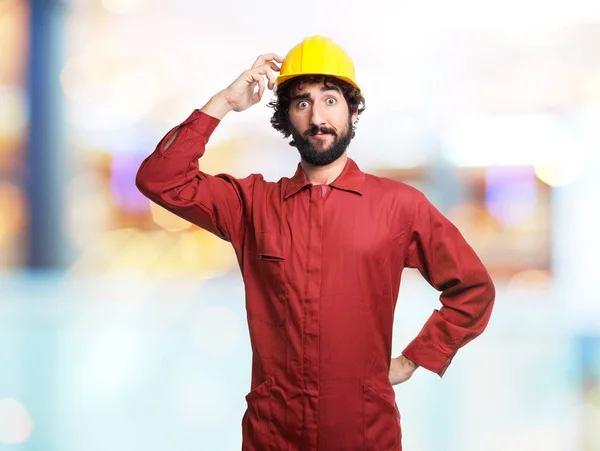 Concentrated worker man doubting